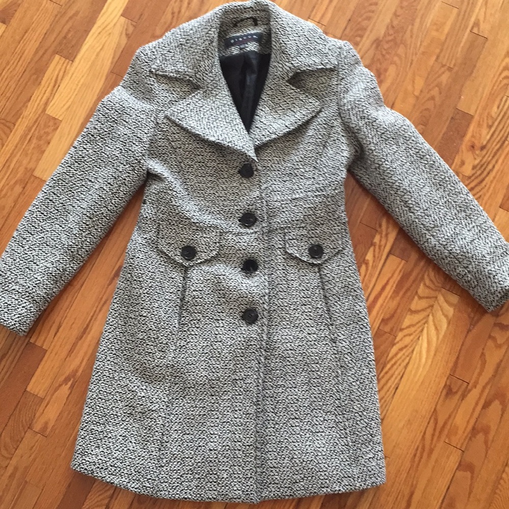 Women’s pea coat in black and white mottle.